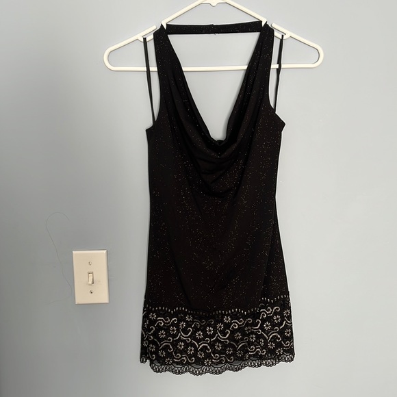 Fancy black halter top with lace bottom detailing. - Picture 1 of 5